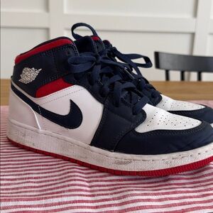Air Jordan Navy and White Sneakers with red bottoms!